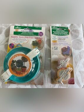 Clover Jumbo and small Pom-Pom Maker Sets in Teal, white and pink.